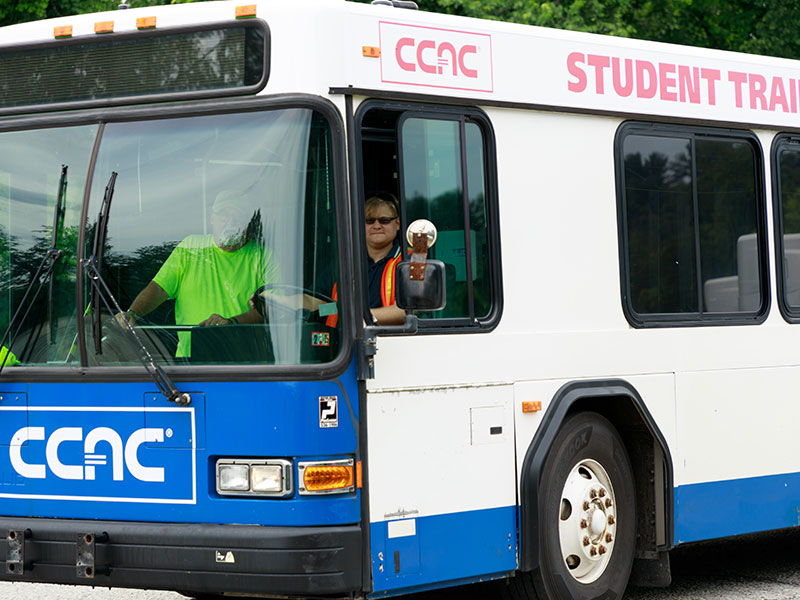CCAC student with instructor on CCAC's new Class B/Passenger training bus