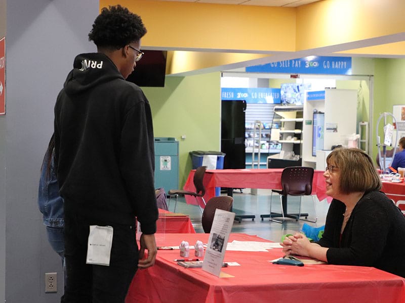 Prospective students explore options at a CCAC open house event.
