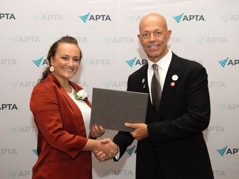 Alysse Dambrot, CCAC PTA student receives her Mary McMillan Scholarship Award from APTA President Roger Herr, PT, MPA.