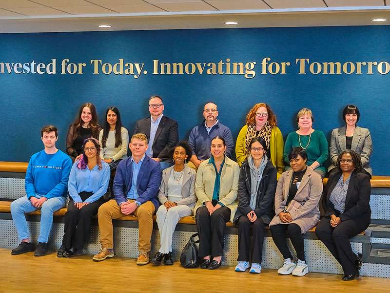 BNY Mellon’s STARTUP program team and mentors met with CCAC student participants during the opening ceremony at the company’s Pittsburgh headquarters. Left to right, first row: CCAC students Alex Steward, Ashley Kocyan, Austin Ledergerber, Cynthia Obiekezie, Julia Mobley, Eh Tauhtoo Shwe, Nadine Kamba, Monique Brown Knight. Second row: Madison Schwartzmiller, BNY Mellon program coordinator, STARTUP Campus Mentorship Program; Karpagapriya (Priya) Komathivanan, BNY Mellon program manager, STARTUP Campus Mentorship Program; Jeffrey Diegelmann, BNY Mellon mentor, STARTUP Spring 2023 Cohort; John Swiderski BNY Mellon mentor, STARTUP Spring 2023 Cohort; Brianne Hess, BNY Mellon mentor, STARTUP Spring 2023 Cohort; Susanne Diehl, CCAC career specialist and STARTUP coordinator; Melissa Lelii, BNY Mellon Engineering head of engagement.