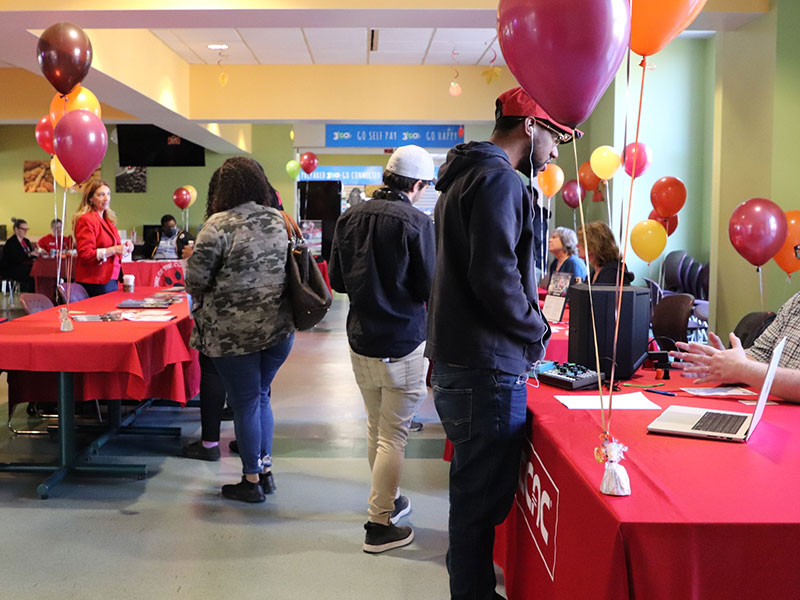 CCAC students, faculty and staff interact during a celebratory event in the Foerster Student Services Center on the Allegheny Campus.