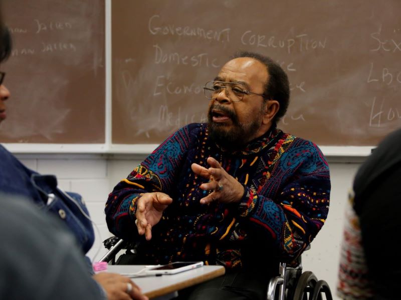 Dr. Ralph Proctor, professor of Ethnic & Diversity studies, leads a class discussion at CCAC.