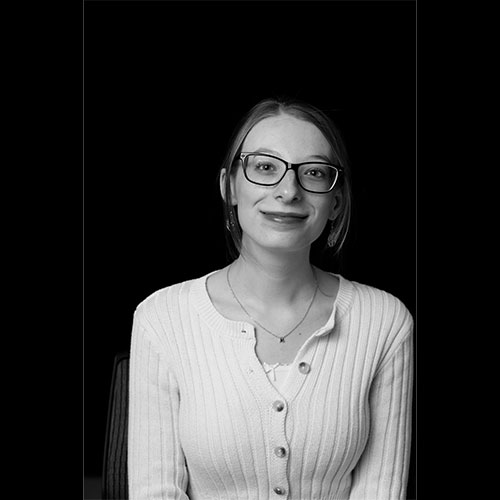 A black and white headshot of Autumn Crown