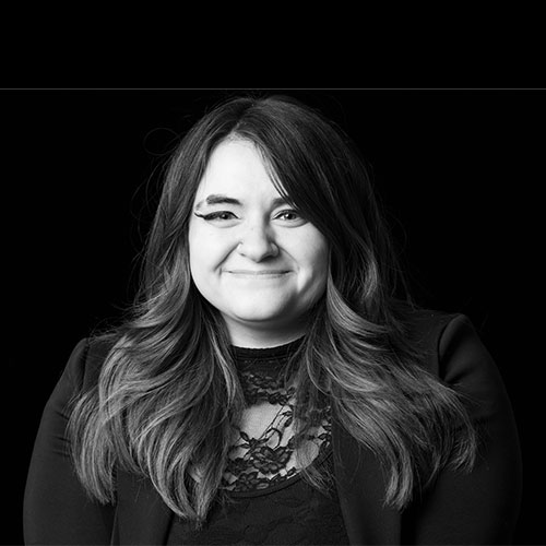 A black and white headshot of Maria Aguayo