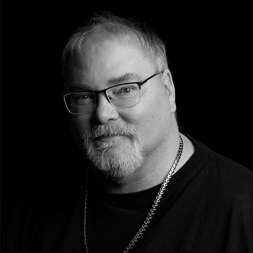 A headshot of John Malarky