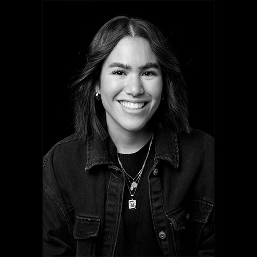 A black and white headshot of Maria Aguayo