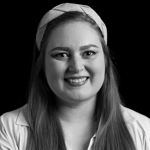 A black and white headshot of Savannah Graham