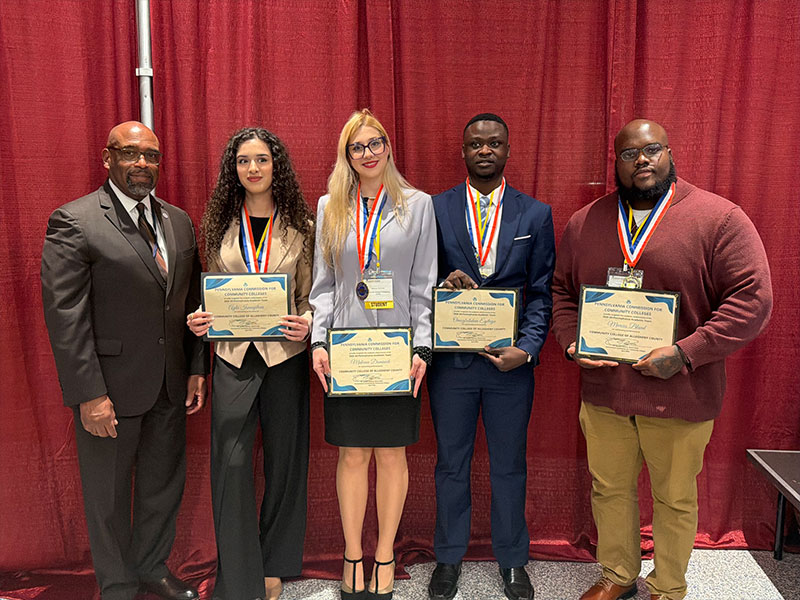 Dr. Quintin Bullock, CCAC President (far left) joined CCAC’s All-PA Academic Team award students (left to right) Ayla Ismayilova, Maleena Dominick, Omogbolahan Eyitayo; Marcus Bland during the recent PACCC awards dinner.