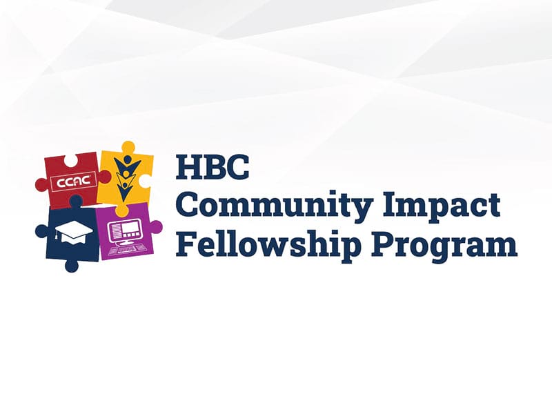 A logo for the Homewood Brushton Center Community Impact Fellowship program . Has 4 Puzzle pieces connecting together. One Burgundy, one Dark Blue, one Purple and one Yellow.